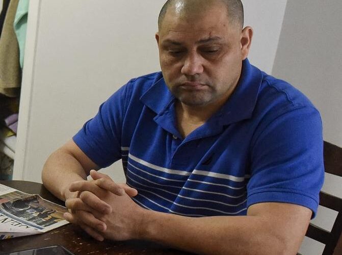 Eleazar Lopez Ayala sits at the kitchen table in his Manchester home last month.